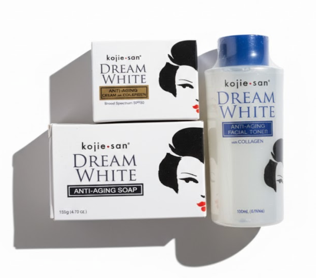Kojie San Dream White skincare products including soap, cream, and toner on a white background